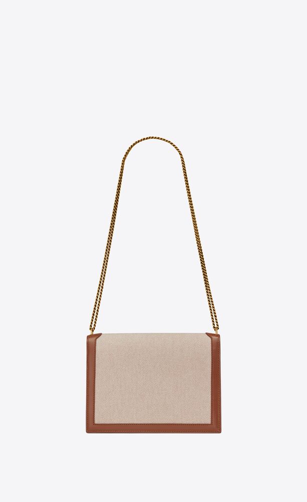 SaintLaurent_cassandra monogram clasp bag in canvas and smooth leather thumbnail