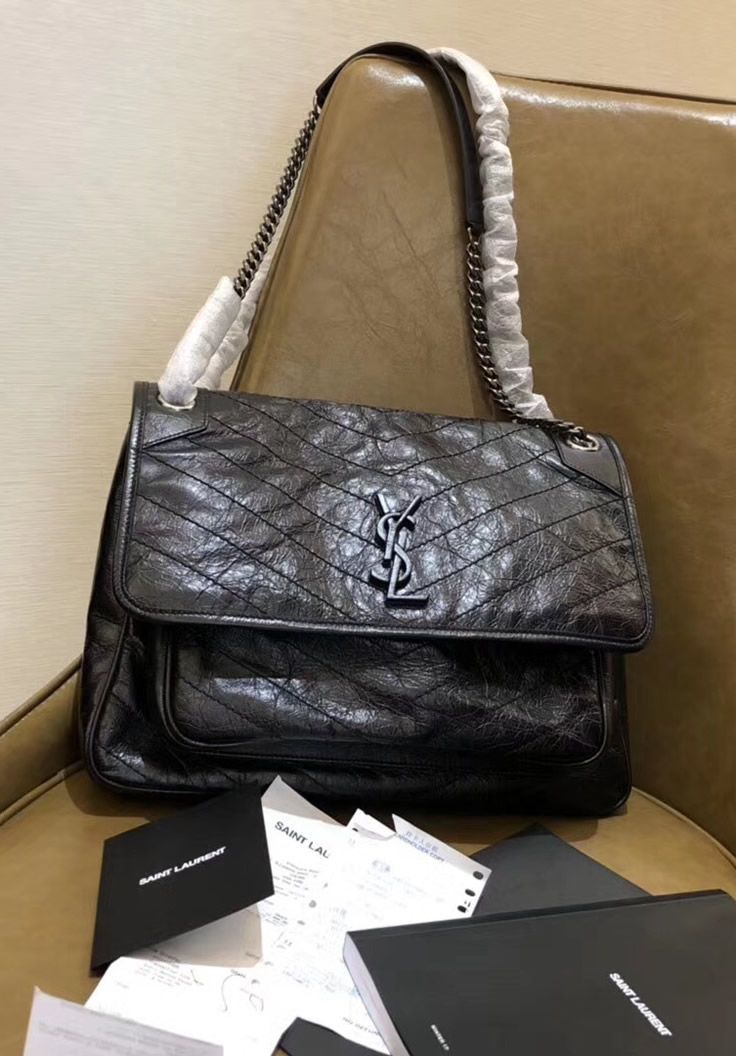 SaintLaurent_large niki chain bag in crinkled and quilted leather