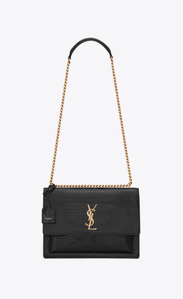 SaintLaurent_sunset large in crocodile-embossed shiny leather
