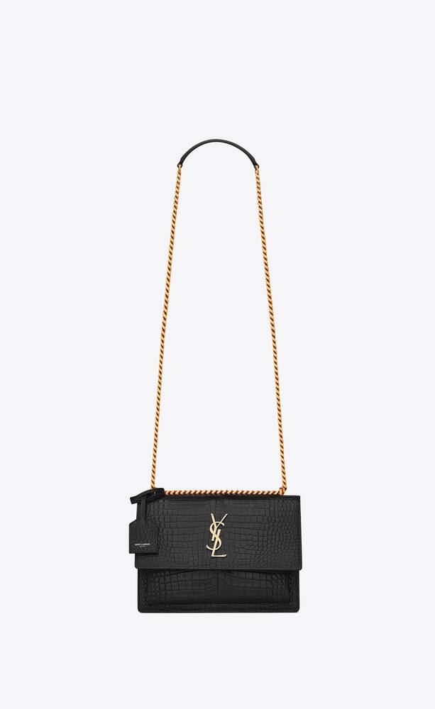 SaintLaurent_sunset large in crocodile-embossed shiny leather