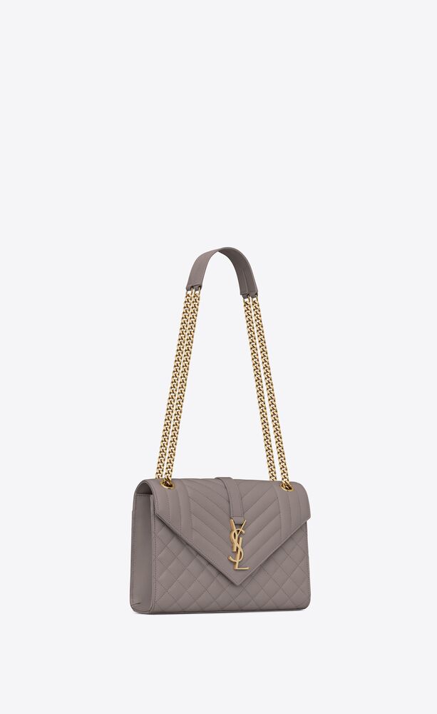 SaintLaurent_믹스 마틀라세 그랑 드 뿌드르 엠보스드 가죽 소재의 엔벨로프 미디엄 백