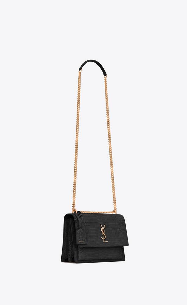 SaintLaurent_블랙 크로커다일 무늬가 양각으로 새겨진 샤이니 가죽 소재의 미디엄 선셋 백