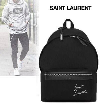 SaintLaurent_생 로랑 시그니처 자수 디테일과 블랙 캔버스 소재의 시티 백팩 thumbnail