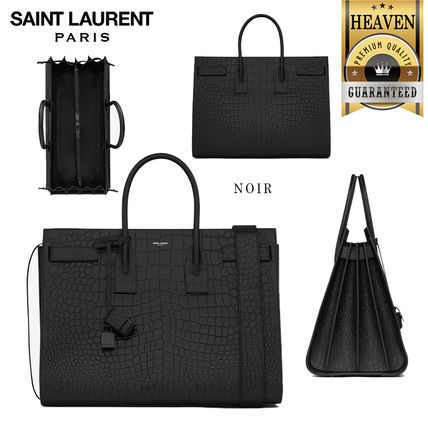 SaintLaurent_크로커다일 무늬가 새겨진 블랙 가죽 소재의 라지 삭 드 주르 캐리 올 백