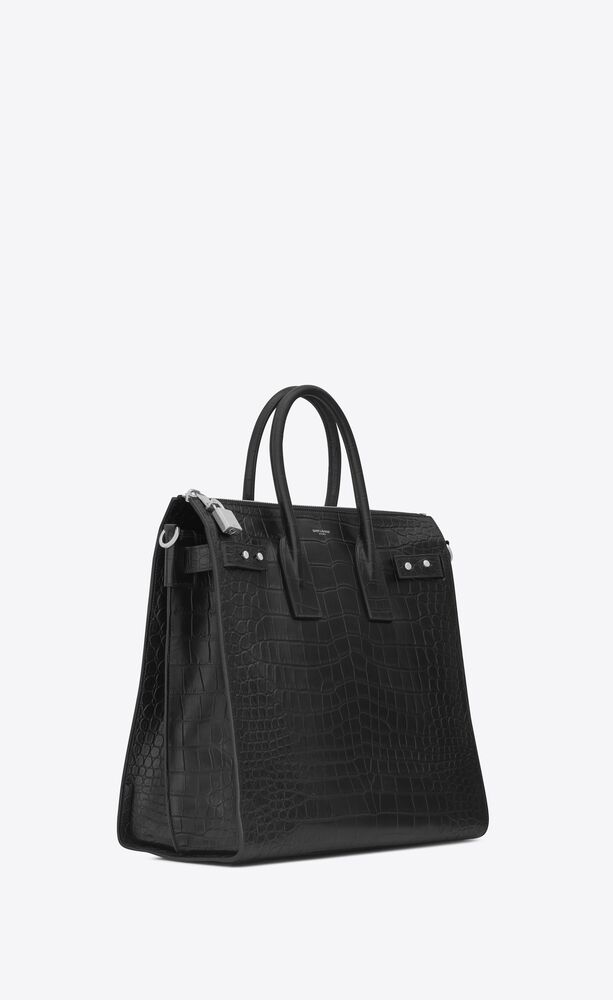 SaintLaurent_크로커다일 무늬가 새겨진 블랙 가죽 소재의 삭 드 주르 서플 노스 사우스 토트